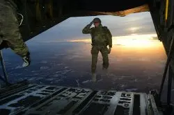 Army soldier jumping out of plane