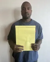 Kanye West Holding A Piece Of Paper