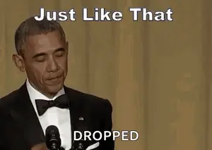 Barack Obama Is Giving A Speech In Front Of A Microphone And Making A Funny Face .