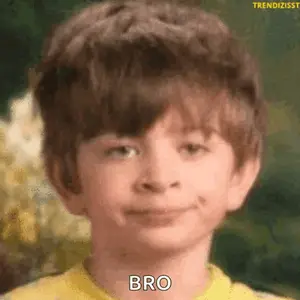 A Young Boy Wearing A Yellow Shirt Is Smiling And Saying Bro .