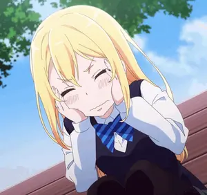 A Girl With Blonde Hair And A Blue Bow Tie Is Making A Sad Face