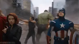 A Group Of Avengers Including Captain America And Black Widow Are Standing In A City
