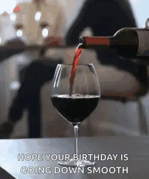 A Bottle Of Wine Is Being Poured Into A Glass With The Caption Hope Your Birthday Is Going Down Smooth .