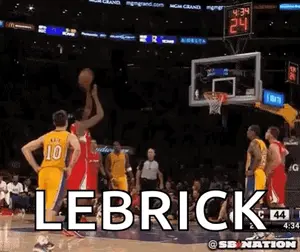 A Basketball Player Is Jumping In The Air To Catch A Basketball And The Word Lebrick Is Written On The Screen .
