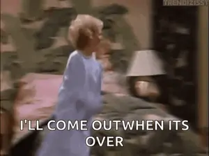 A Woman In A Blue Dress Is Standing On A Bed And Says I 'Ll Come Out When It 'S Over