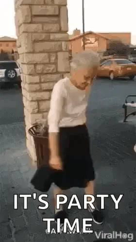 An Elderly Woman Is Dancing In Front Of A Brick Wall And Says `` It 'S Party Time '' .