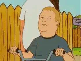 A Cartoon Character From King Of The Hill Is Riding A Bike .