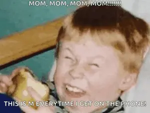 A Young Boy Is Holding A Banana And Making A Funny Face With The Caption Mom Mom Mom Mom