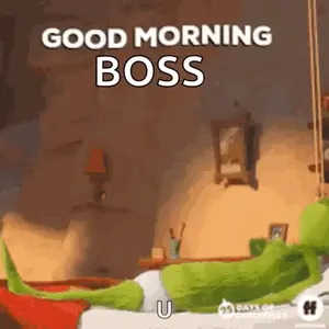 A Grinch Is Laying On A Bed With A Good Morning Boss Greeting .