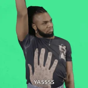 A Man With A Beard Is Wearing A T-Shirt With A Hand On It And Says Yasssss .