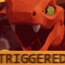A Close Up Of A Dinosaur 'S Face With The Word Triggered Behind It