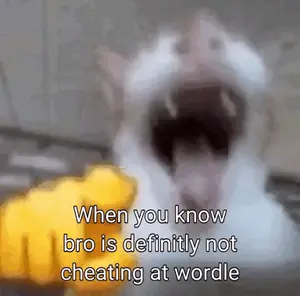 A Blurred Image Of A Cat With Its Mouth Open And A Yellow Fist Pointing At It .