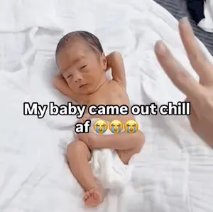 A Baby In A Diaper Is Laying On A Bed With A Caption That Says " My Baby Came Out Chill Af "