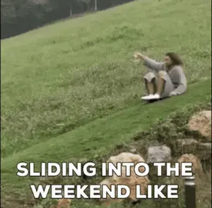 A Person Is Sitting On A Grassy Hill With The Caption Sliding Into The Weekend Like