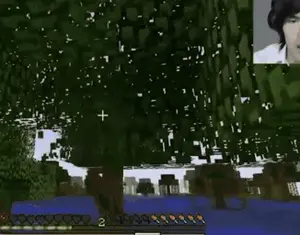 A Screenshot Of A Video Game With A Person 'S Face Visible In The Corner