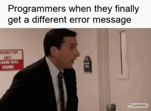 A Man In A Suit And Tie Is Standing In Front Of A Door With A Different Error Message .