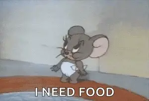 Jerry From Tom And Jerry Is Yawning And Saying I Need Food .