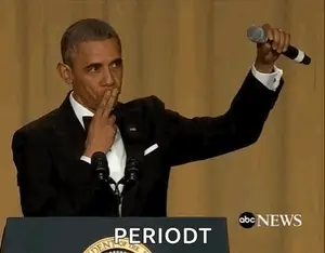 Barack Obama Is Giving A Speech At A Podium While Waving His Hand .