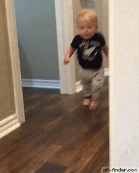 A Baby Is Running Through A Hallway With A Gif-Finder.Com Watermark On The Bottom