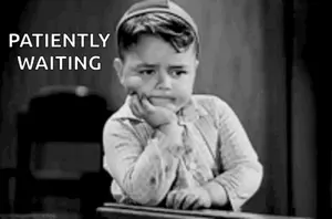 A Little Boy Is Sitting At A Desk With His Hand On His Chin And The Words `` Patiently Waiting '' Written Above Him .