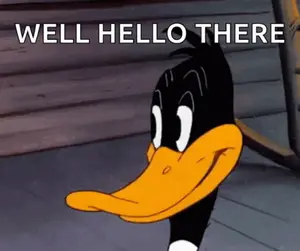 A Cartoon Duck Says Well Hello There In Front Of A Building
