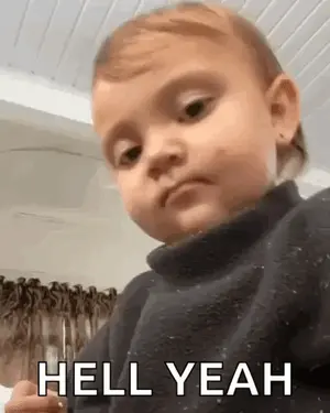 A Baby Is Making A Funny Face With The Words `` Hell Yeah '' Written On It .