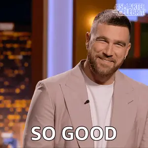 A Man In A Suit Says So Good In Front Of A Smarter Than Celebrity Logo