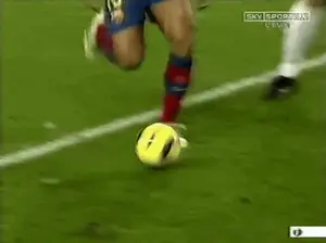 A Soccer Player With The Number 5 On The Back Of His Shirt