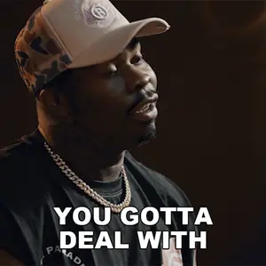 A Man Wearing A Hat And A Shirt That Says You Gotta Deal With