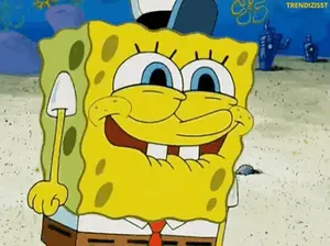 Spongebob Squarepants Is Smiling And Holding A Shovel In His Hand