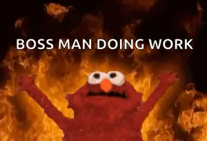 Elmo Is Standing In Front Of A Fire With The Words `` Boss Man Doing Work '' Written Above Him .