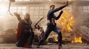 Thor And Captain America Are Standing In Front Of A Building