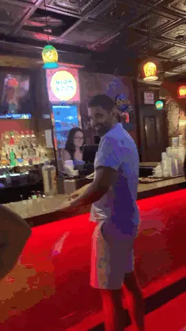 A Bar With A Sign That Says High Noon