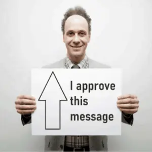 A Man Is Holding Up A Sign That Says I Approve This Message