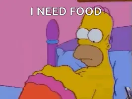 Homer Simpson Is Laying In Bed With A Blanket And Says I Need Food .