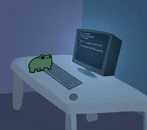 A Frog Sits On A Keyboard Next To A Computer Monitor That Says ' System ' On The Screen