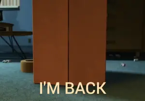 Woody From Toy Story Is Peeking Out From Behind A Cardboard Box That Says I 'M Back