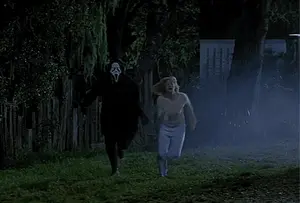 A Woman Is Running Away From A Man With A Scream Mask On His Face