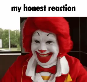 A Mcdonald 'S Clown With Red Hair And A Bow Tie Is Smiling And Says My Honest Reaction