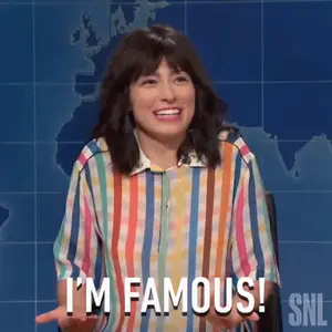 A Woman In A Striped Shirt Says I 'M Famous On Snl