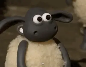 A Close Up Of A Cartoon Sheep With Big Eyes Making A Face .