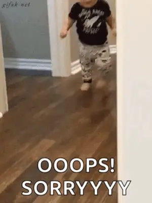 A Baby Is Running Down A Hallway And Saying `` Oops ! Sorry Yy '' .