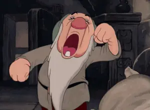 A Cartoon Character Is Yawning With His Mouth Open