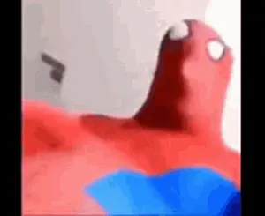 A Close Up Of A Spider Man Costume With His Mouth Open