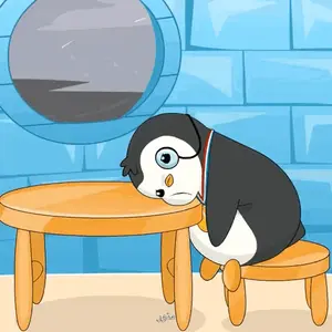 A Penguin Sitting At A Table With A Medal Around His Neck