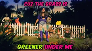 A Woman Is Standing In A Garden With The Words Cuz The Grass Is Greener Under Me On The Bottom