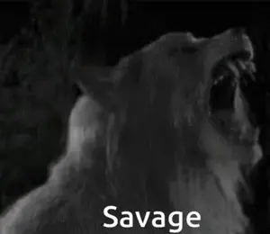 A Black And White Photo Of A Bear With Its Mouth Open And The Word Savage Written On The Bottom