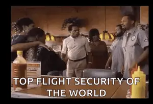 A Group Of People In A Diner With The Words Top Flight Security Of The World