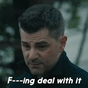 A Man 'S Face Is Shown With The Words F-Ing Deal With It Above Him