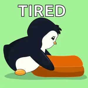 A Penguin Laying On A Piece Of Soap With The Word Tired Written Above It